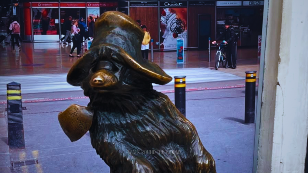 Paddington Bear bronze statue at Paddington Station London