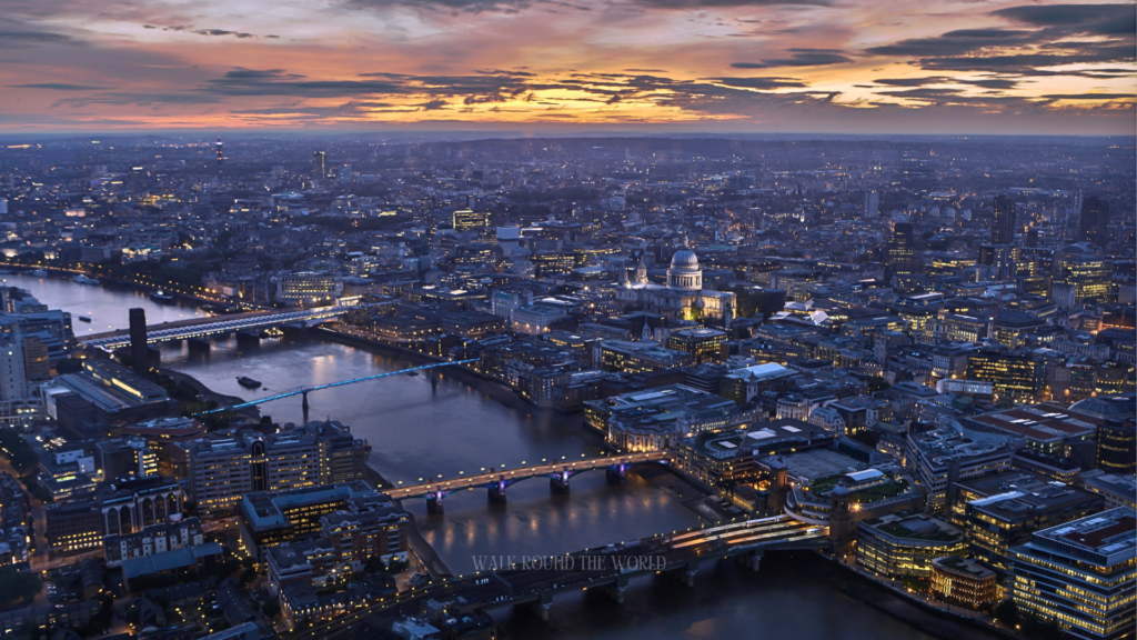 Aerial view of London showing the River Thames, skyline, and central districts from above