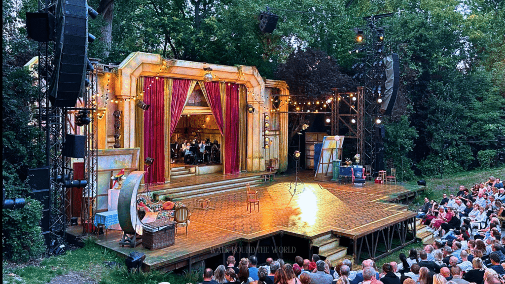 Audience watching a performance at Regent’s Park Open Air Theatre in London