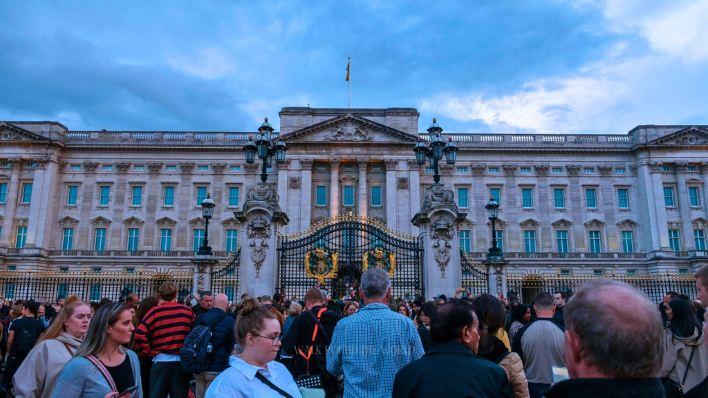 Buckingham Palace during summer in London with visitors outside