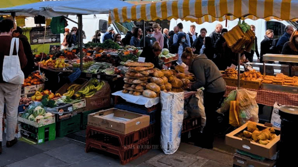 Busy Portobello Road Market in Notting Hill London during summer