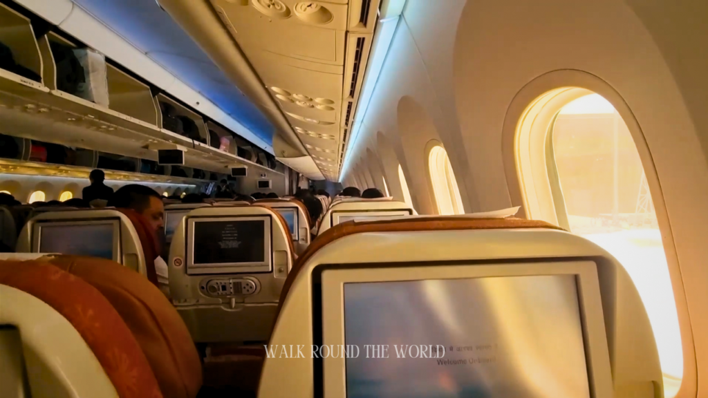 Inside Air India flight AI 133 economy class cabin on Bangalore to London route
