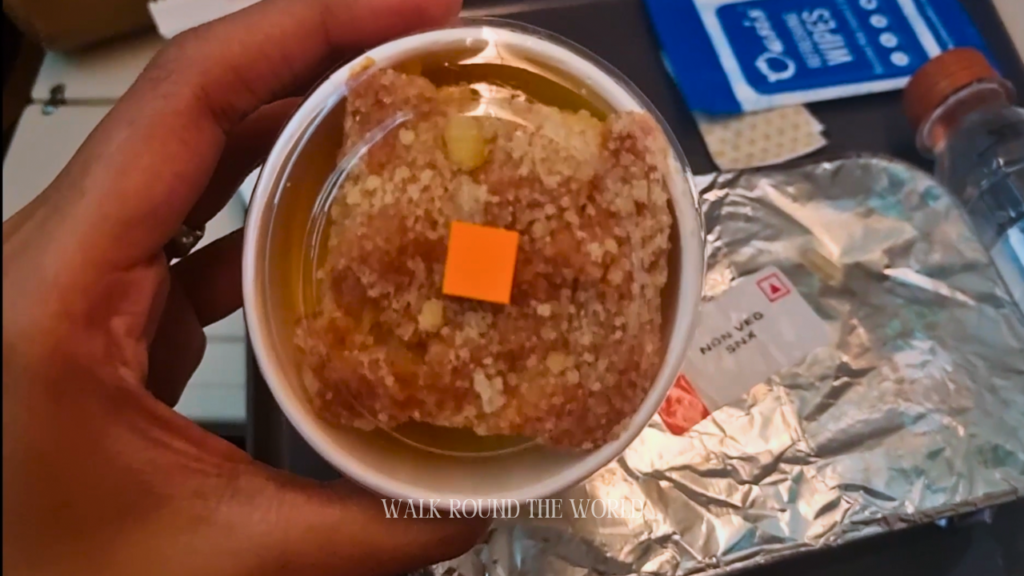 Close-up of dessert served with Hindu Non-Veg pre-booked snack meal on Air India flight AI 133