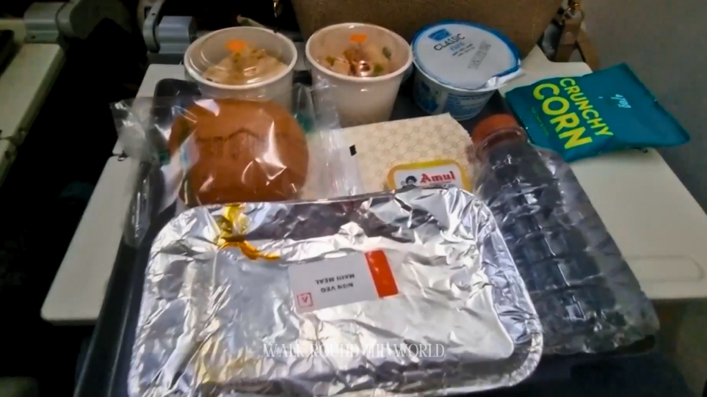 Air India economy class first proper meal tray featuring Non-Veg Muslim meal on flight AI 133 to London