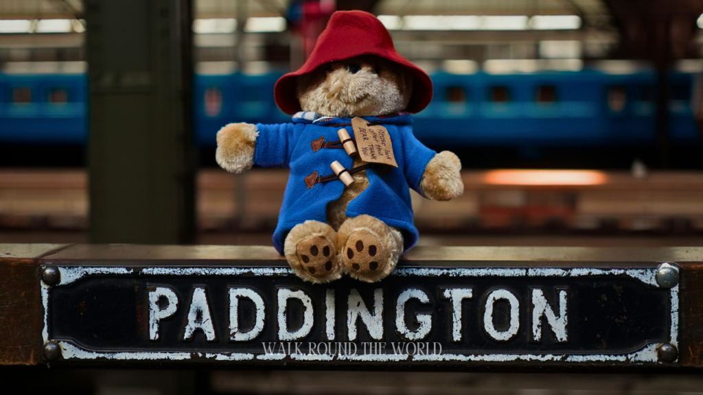 Paddington Bear at Paddington Station London sign