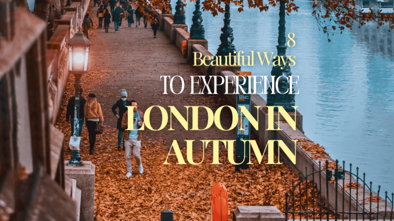 London in autumn with a tree-lined riverside walkway covered in golden leaves